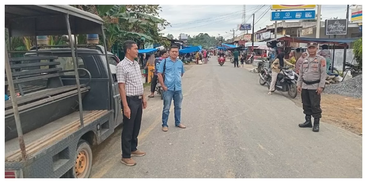 Keterangna Foto : ersonel Polsek Marbau melakukan pemantauan situasi sekaligus berinteraksi langsung dengan warga (Realitasonline.id /  Arif)