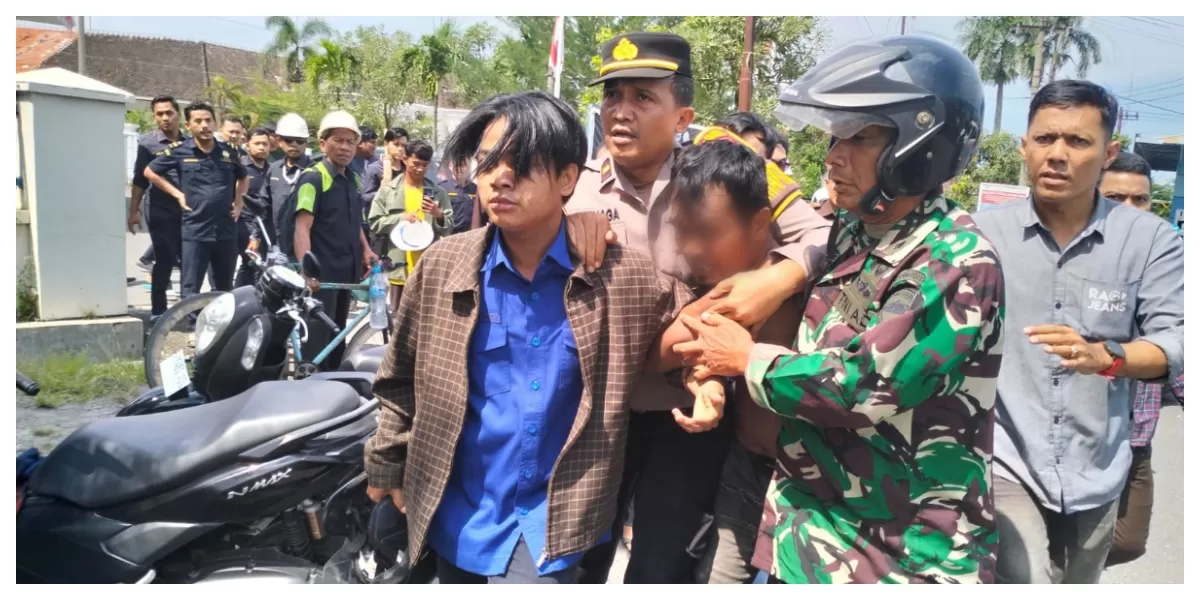 AM diselamatkan Personil Koramil 09/MB Kodim 0201/Medan dari amukan massa saat melakukan aksi pencurian di eks Kantor Kejari Belawan (Realitasonline.id/Dok)