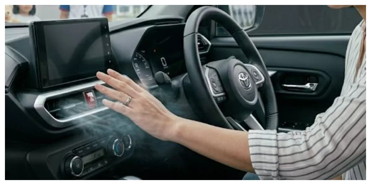 Ilustrasi pengaturan AC mobil saat perjalanan jauh di cuaca panas (Realitasonline/ Canva)