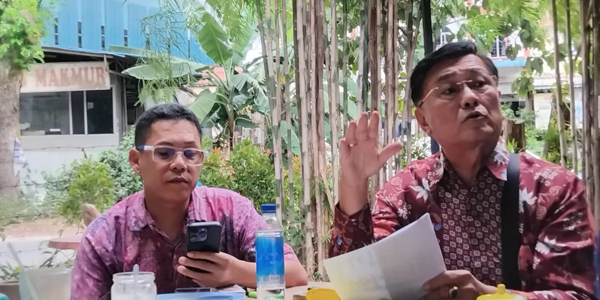 Jeni alias Law Bun Hian, kanan dan kuasa hukum, Romesko Purba,kiri. Foto: Ria Fahfudin (Ria fahrudin)