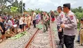 Mesin Motor Mati di Tengah Rel, Seorang Wanita Tewas Dilindas Kereta Api di Batu Bara