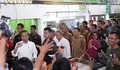 Presiden Jokowi Bagikan Uang dan Kaos di Pajak Delimas Lubuk Pakam