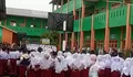 Yayasan Pendidikan Parmiyatu Wassa’adah Deli Serdang Gelar Upacara Hari Guru Nasional 2025 di Tengah Rintik Hujan