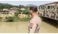 Antisipasi Perubahan Cuaca Ekstrim,  Polsek Aek Natas Lakukan Pengecekan Debit Air Sungai Bandar Durian 