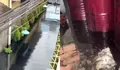 Penampungan Oli Bekas Diduga Meluap, Banjir di Sukoharjo Berwarna Hitam: Sudah Disumbat Karung, Tetap Keluar