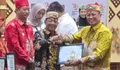 Bupati Heriyus Terima Penghargaan Program Bangga Kencana
