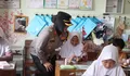 Jumat Berkah, Polres Salatiga Bagikan 1.000 Paket MBG untuk Pelajar dan Santri