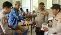 Polres Manggarai Barat Salurkan Perlengkapan Sekolah di TRK Lobohusu