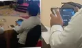 Viral Kepala BGN Jambi Diduga Main Game Saat Rapat, Klarifikasi Adityo Picu Perdebatan