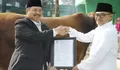 Bobot Hampir 1 Ton, Bupati Warsubi Serahkan Sapi Kurban Bantuan Presiden Prabowo ke Masjid Denanyar Jombang