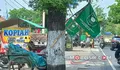 Jelang Muktamar ke 35 NU di Jombang, Pemasangan Bendera Terpaku di Pohon Jadi Sorotan Publik