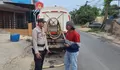 Polsek Batu Ampar Laksanakan Pengamanan Hari Ke-15 Pendistribusian Air Bersih di Tanjung Sengkuang