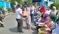 Bantu Perekonomian Masyarakat, Alumni Akpol Bersama Karang Taruna Karang Turi Bagikan 500 Paket Sembako