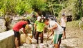 Kemanunggalan TNI-Rakyat di Marampit Timur: Bersihkan dan Perbaiki Jalan Produksi Terdampak Hujan.