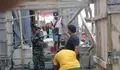 Semangat Gotong royong Babinsa Bantu warga Masyarakat Desa Binaan Bangun Rumah Ibadah