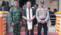 Babinsa dan Babinkamtibmas Bersinergi, Amankan Ibadah Jumat Agung