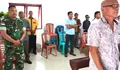 Babinsa Karatung Selatan, Serda Robin Taringanen Amankan Ibadah Minggu Umat Kristen Di Gereja Imanuel Karatung