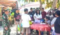 Bantuan Sembako dari Presiden RI di kawal Babinsa Koramil 1312-07/Miangas, Serka Febri Talu