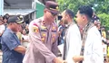 Kapolsek Kabaruan, Ipda Andika Eka Putra Amisi Hadiri Penjemputan Dua Imam Baru Umat Roma Katolik Mangaran