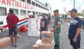 Pastikan Kegiatan Bongkar Muat Aman dan Lancar Babinsa koramil 1312- 02/lirung laksanakan P emantauan penumpang kapal