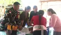 Babinsa Koramil 03/Beo Bersama Kader Posyandu Desa Tarohan Laksanakan Kegiatan Posyandu