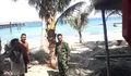 Babinsa Koramil Melonguane Serda Jenri Thomas MeLaksanakan Komsos Bersama Masyarakat