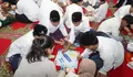 Momentum Ramadan, AXA Mandiri Santuni Anak Yatim dan Kenalkan Literasi Keuangan