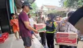 Langkah Nyata Polres Metro Depok Respon Banjir : Lakukan Pemeriksaan Kesehatan, Bagikan Takjil di Sawangan 