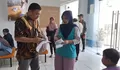BRI Unit Pekapuran Cimanggis Salurkan Dana Program Indonesia Pintar ke Siswa Penerima Bantuan