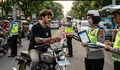 Siap-siap Operasi Patuh 2026: Polisi Siap Berburu “Ninja Aspal” Penutup Pelat Nomor Anti-ETLE