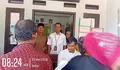 596 Warga Desa Pasirgadung Terima Bantuan Beras dan Minyak, Penyaluran Berjalan Lancar dan Kondusif