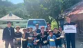 IZI Kembali Salurkan Sedekah Nasi Kotak untuk Warga di Desa Loli Tasiburi