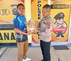 Polsek Tapung Serahkan Bantuan Bibit Jagung untuk Dukung Ketahanan Pangan