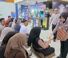 Pemohon SIM Antusias, Satlantas Polresta Pekanbaru Hadirkan Sensasi Nobar Piala Dunia di Ruang Pelayanan