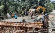 Pemkab Dharmasraya Genjot Pembangunan Infrastruktur, Rp63,6 Miliar Digelontorkan untuk Jalan dan Jembatan