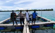 Polsek Demta Bersama Masyarakat Budidaya Keramba Ikan