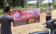 Melalui Media Spanduk, Polsek Serbajadi Sosialisasi Karhutla kepada Warga
