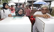 Wali Kota Susanti dan Keluarga Gunakan Hak Pilihnya di TPS 04 Nusa Indah