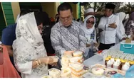 Wali Kota Wesly dan Ketua TP PKK Borong Jajanan di Warung Ramadhan BKMT Siantar
