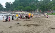 Polisi Bersama Petugas Mengimbau Wisatawan untuk Tidak Berenang di Pantai Karanghawu Pelabuhan Ratu