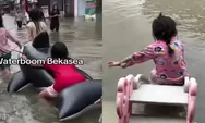 Layaknya Waterboom, Viral Anak-anak Bekasi Justru Asyik Main Air saat Banjir