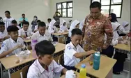 Pj Bupati Bekasi Tinjau Program Uji Coba Makan Bergizi Gratis di SMPN 2 Tambun Selatan