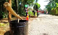 Warga Sukagalih Gotong Royong Bersama Eiger Perbaiki Jalan Rusak