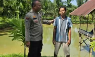 Dukung Ketahanan Pangan, Bhabinkamtibmas Rumbai Bukit Cek Kolam Patin Warga Binaan