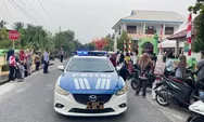 Jaga Rute Pawai Maulid Nabi, Satlantas Polres Natuna Hadirkan Rasa Aman bagi Ratusan Siswa SD