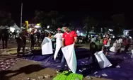 Keren, Meski Timnas Kalah Bupati Ajak Warga Pungut Sampah usai Nobar di Alun-alun