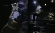 Momen Ayah dan Anak Seberangi Sungai Berarus Deras dengan Tali Sling di Kecamatan Ketol, Penerangan Seadanya dari Senter Warga