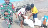 Babinsa Koramil 1312-03/Beo, Serda Pestus Papia Membantu Warga Desa Tarohan Ambil Material untuk Pembuatan Rumah