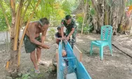 Babinsa Koramil 08/Mlg Bantu Pembuatan Perahu Warga Di Desa Tule