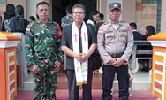 Babinsa dan Babinkamtibmas Bersinergi, Amankan Ibadah Jumat Agung
